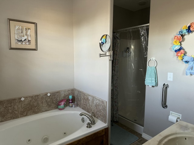 bathroom featuring tile patterned flooring and shower with separate bathtub