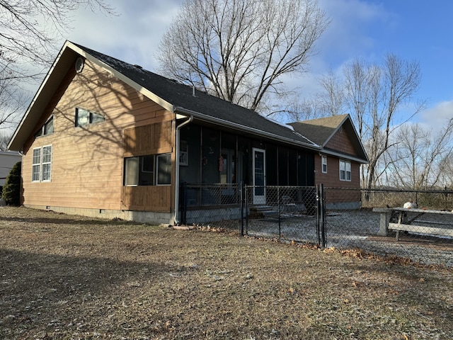 exterior space featuring a sunroom