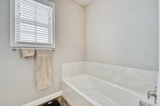 bathroom with a tub