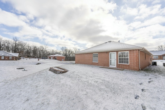 view of snow covered property