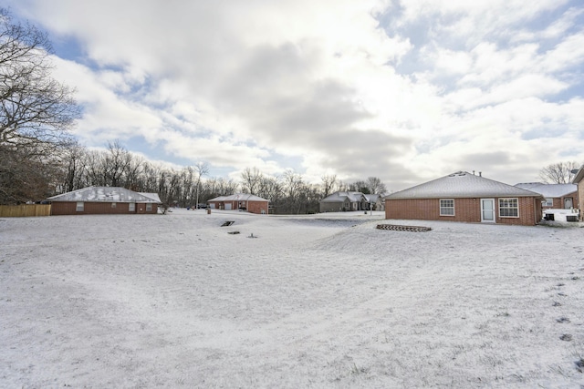 view of yard covered in snow