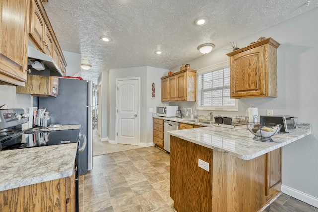 kitchen with dishwasher, light stone counters, kitchen peninsula, black / electric stove, and a textured ceiling