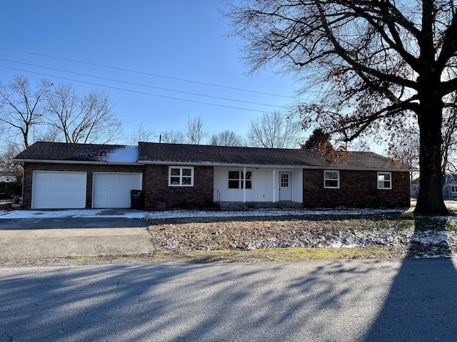 single story home featuring a garage