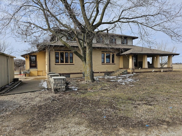 rear view of property with a patio