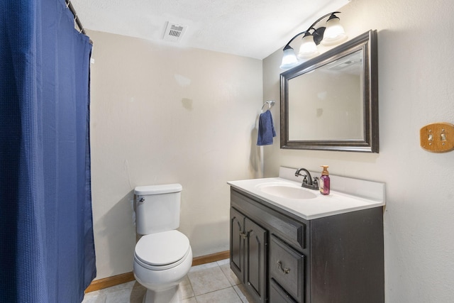 bathroom featuring a shower with curtain, tile patterned flooring, a textured ceiling, toilet, and vanity