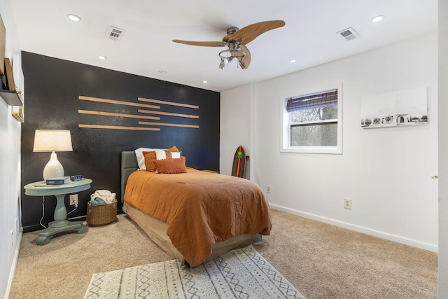 carpeted bedroom featuring ceiling fan