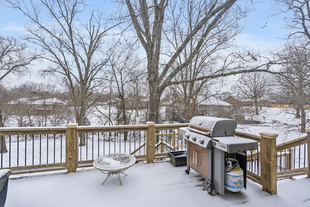 view of snow covered deck