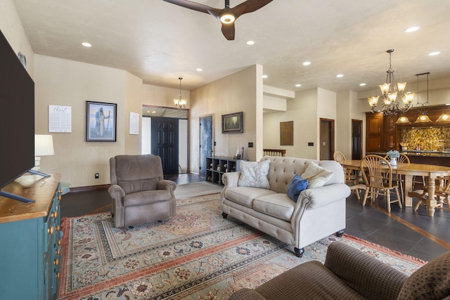 living room with dark tile patterned flooring and ceiling fan