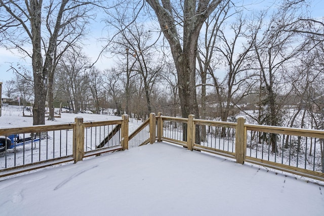 view of snow covered deck