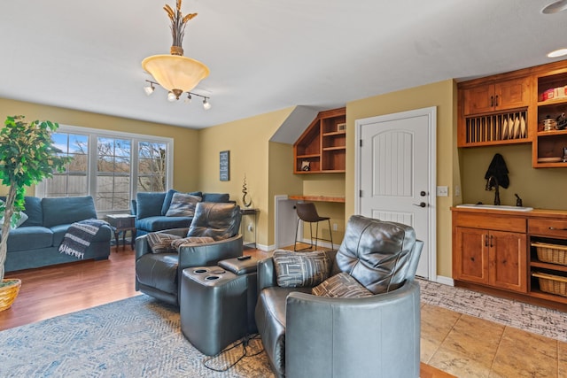 living room featuring baseboards