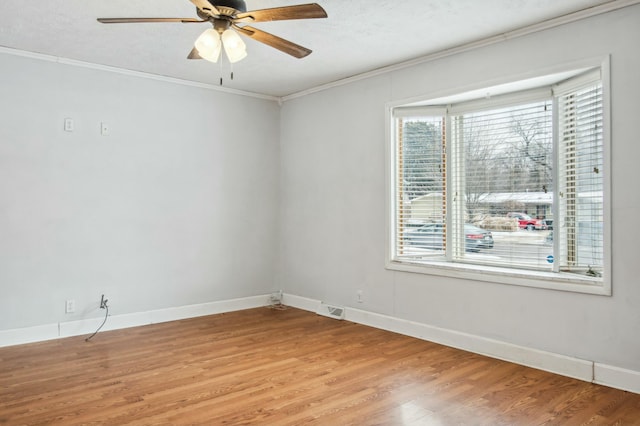 spare room with crown molding, ceiling fan, a textured ceiling, and hardwood / wood-style flooring