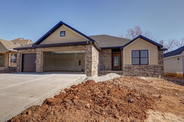 view of front of property with a garage