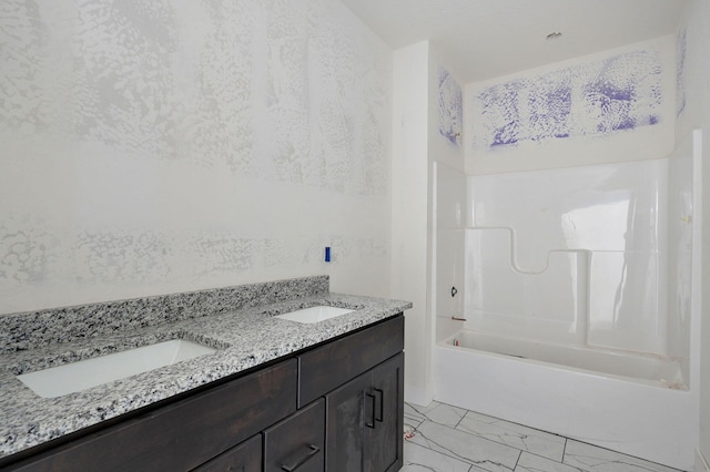 bathroom featuring vanity and bathtub / shower combination