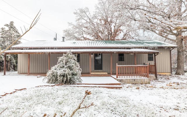 view of snow covered property