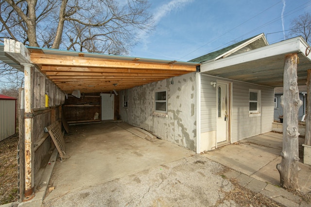 exterior space with a carport