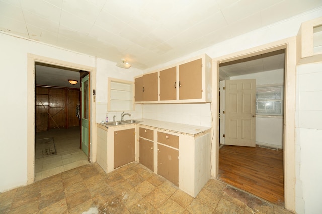 kitchen with tasteful backsplash and sink