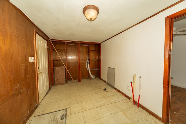 hallway featuring crown molding