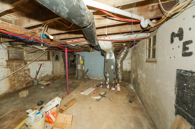 basement with heating unit and water heater