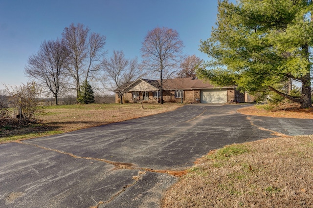 ranch-style house with a garage