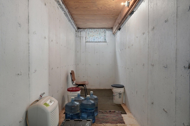 basement featuring wood ceiling