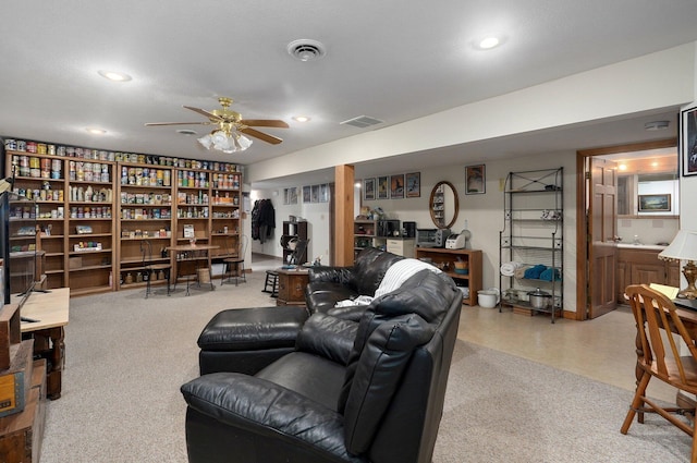 living room with ceiling fan