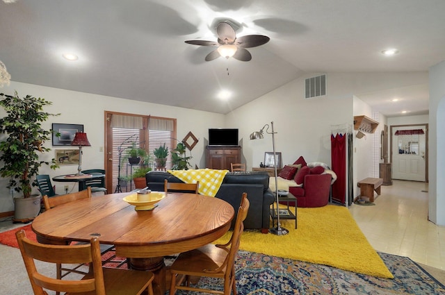 dining room with vaulted ceiling and ceiling fan