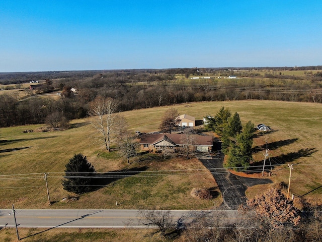 birds eye view of property featuring a rural view