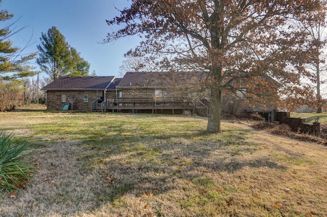 view of yard with a deck