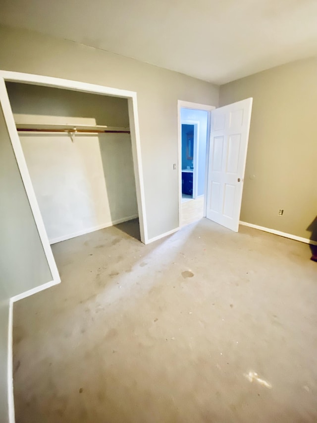 unfurnished bedroom with a closet