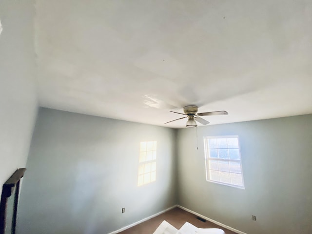 spare room featuring ceiling fan