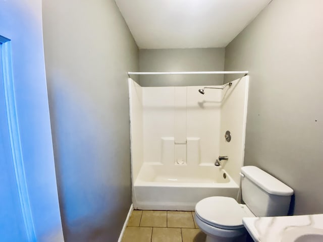 full bathroom featuring tile patterned flooring, vanity,  shower combination, and toilet