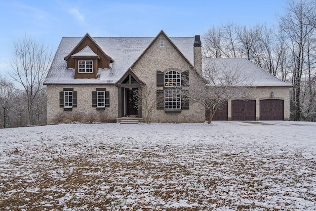 view of front of home with a garage