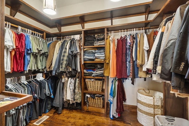 walk in closet featuring hardwood / wood-style flooring