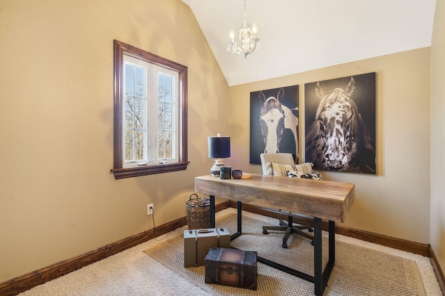 home office featuring carpet flooring, lofted ceiling, and a chandelier