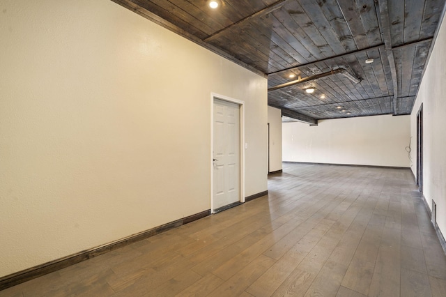 unfurnished room featuring dark hardwood / wood-style floors