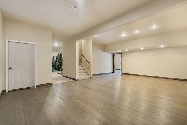 unfurnished room with light hardwood / wood-style flooring