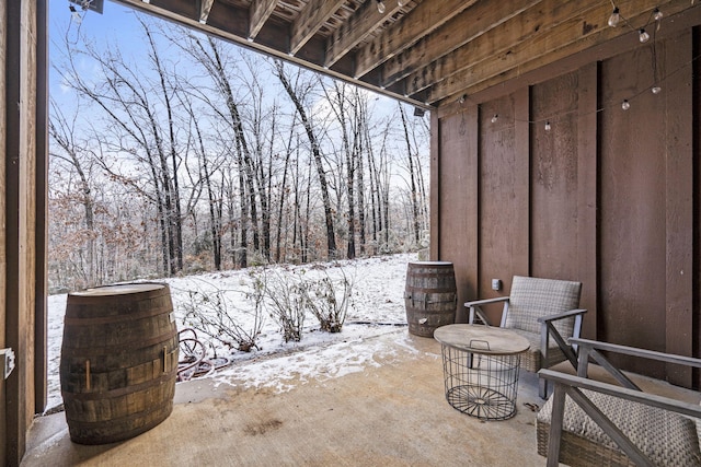 view of snow covered patio