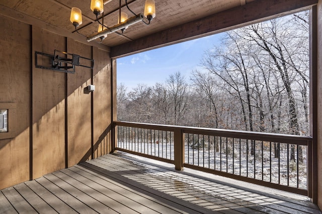 view of snow covered deck