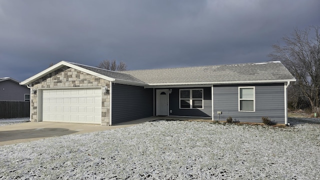 ranch-style house featuring a garage