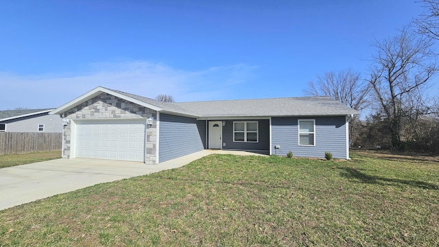 ranch-style house featuring a front yard, fence, driveway, a shingled roof, and a garage