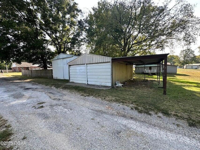 garage featuring a yard