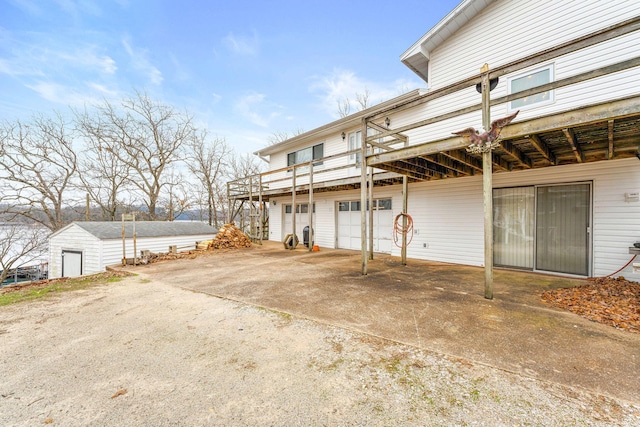 exterior space featuring an attached garage and driveway