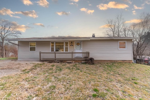 view of front of home featuring a lawn