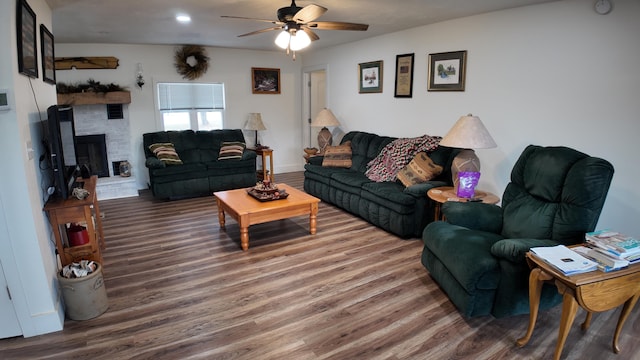 1247 State Hwy N, Clever, MO 65631 - living area featuring wood finished floors, ceiling fan, recessed lighting, and a fireplace