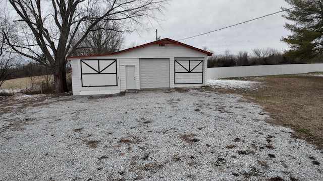 view of outdoor structure with a garage