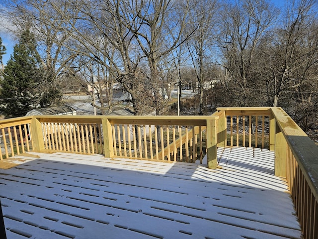 view of snow covered deck