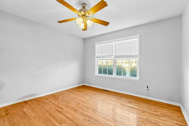 unfurnished room featuring ceiling fan and light hardwood / wood-style floors