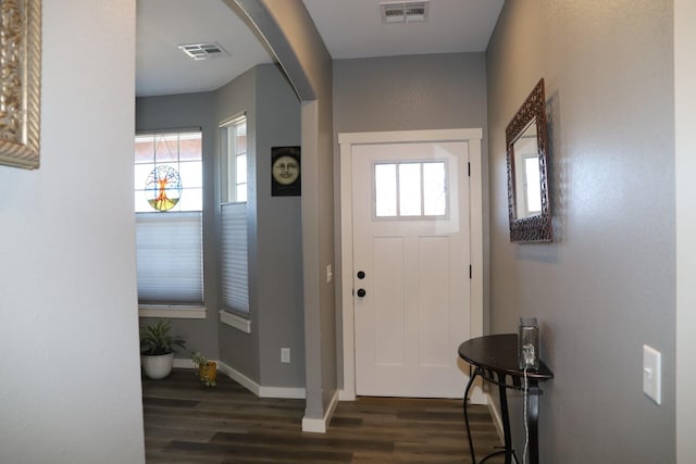 foyer entrance featuring dark hardwood / wood-style floors