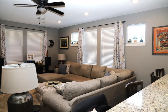 living room with ceiling fan