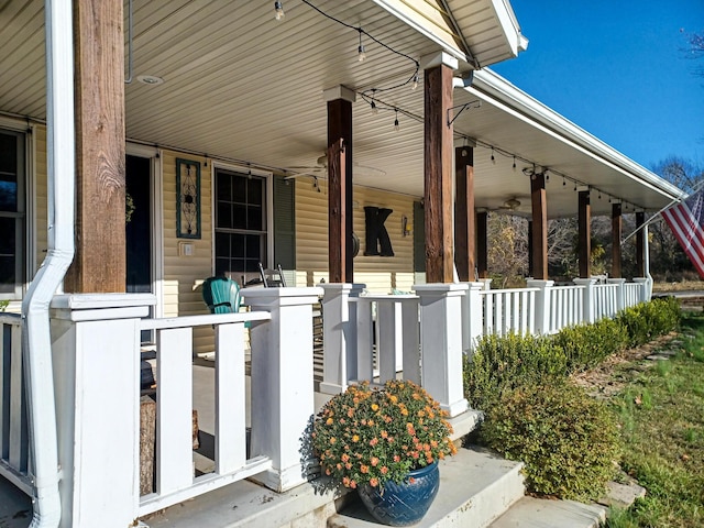 view of side of property featuring covered porch